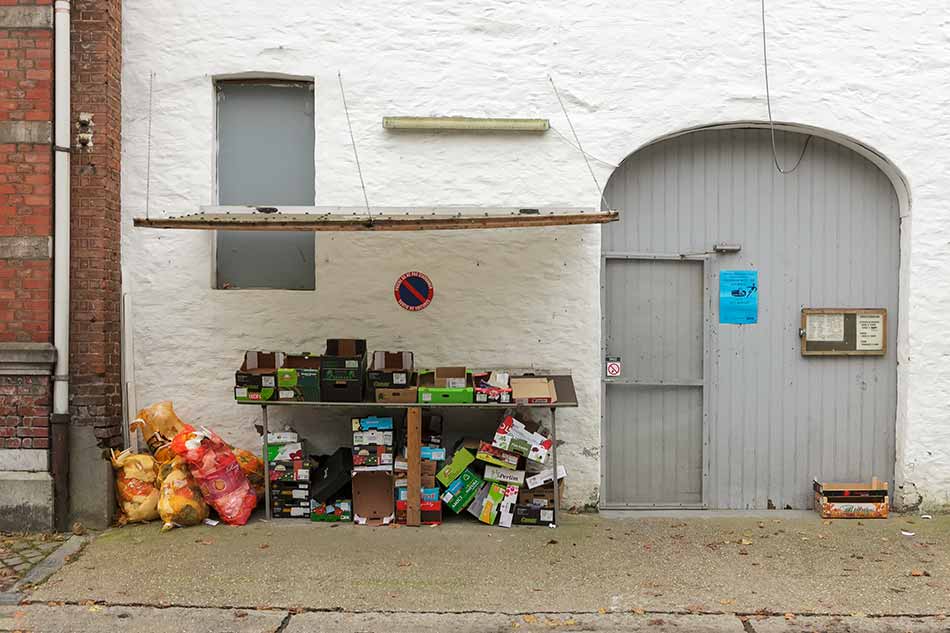 A farm shop with a collection of empty boxes