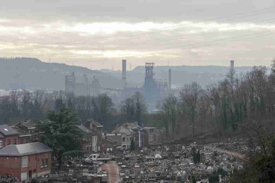 A view of the disused blast furnace with a cemetery in the foreground