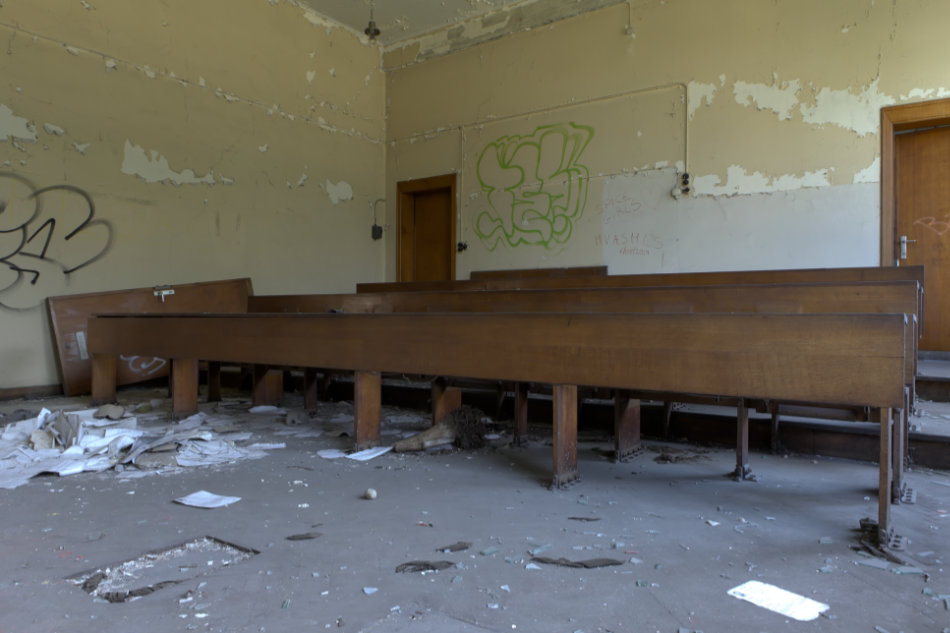 A classroom in an abandoned school building.