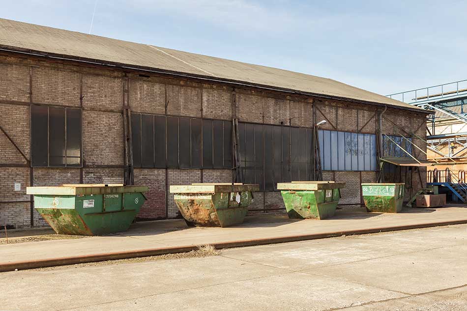 4 containers at a metal company Sunday afternoon