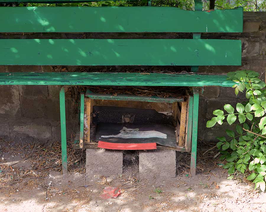 A shelter with a picture of a cat on the mat.