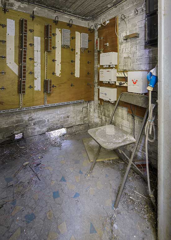 A chair in an abandoned electrical switch-gear cabin