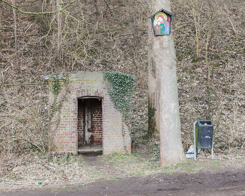 A former well and an image of St. Mary