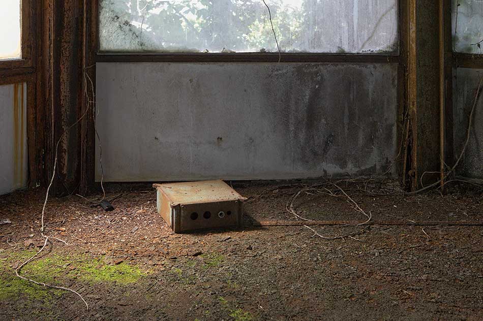 An electrical cabinet in an abandoned signal box