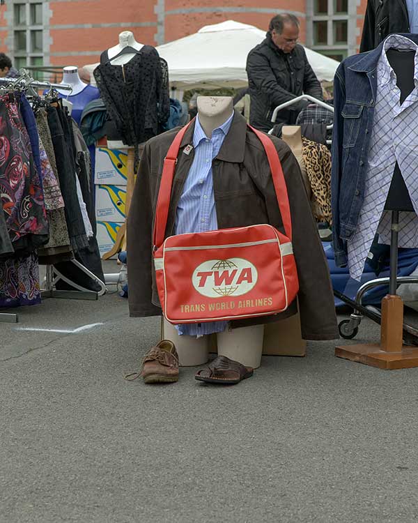 Mannequin with "Trans World Airlines" bag at a flea market